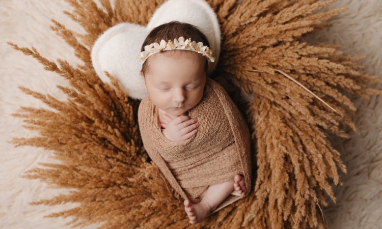 Photographe professionnelle pack shooting grossesse et naissance en studio à Besançon