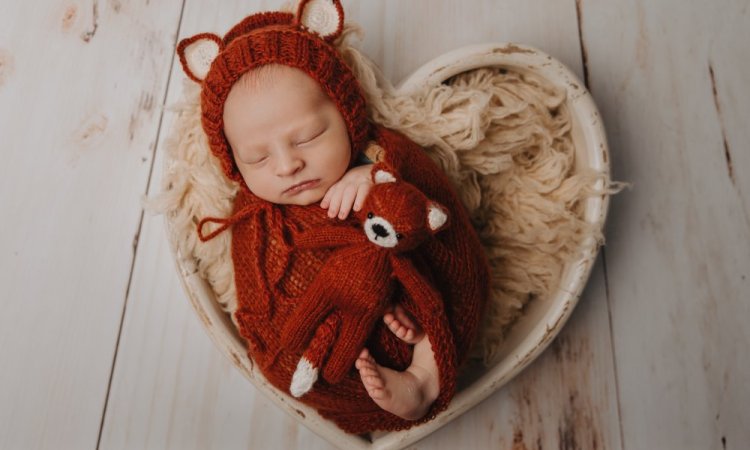 Photographe professionnelle pack shooting grossesse et naissance en studio à Besançon